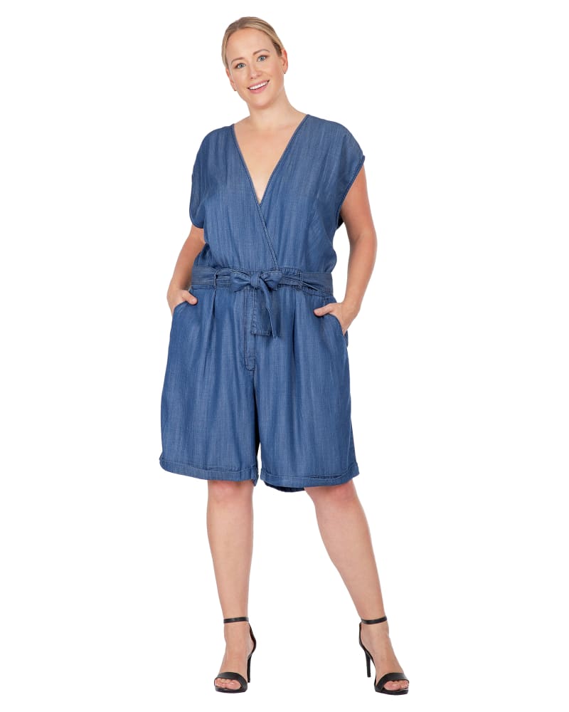 Front of a model wearing a size L Deidra Cap Sleeve Chambray Romper in Indigo Rinse by Standards & Practices. | dia_product_style_image_id:280816